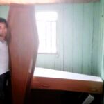 For his father-in-law's birthday, Diego Aparecido Stabile fulfilled a unique wish by gifting him a shiny coffin. Claudinei Paz do Santos expressed joy, storing and caring for it at home, fulfilling a long-held dream. The unconventional gift sparked mixed reactions among family members in São Paulo, Brazil.