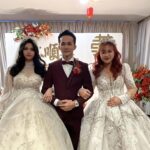A man's unconventional wedding to two brides sparks controversy in Kuching, Malaysia. Lim Soon Kian's celebration faces legal scrutiny, potentially facing charges for bigamy amid uncertainty over the marriage's official status.
