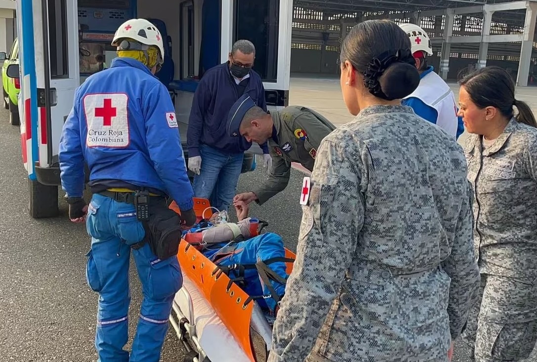 Two paragliders survived six days on Colombia's highest mountain, sustained by sweets after a crash. Rescued by authorities, their survival tale is a testament to human resilience.