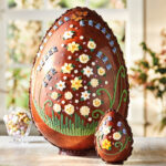 Indulge in luxury with Betty’s Cafe Tea Rooms' £375 Grande Easter Egg, made from Grand Cru Swiss chocolate and adorned with hand-piped flowers.