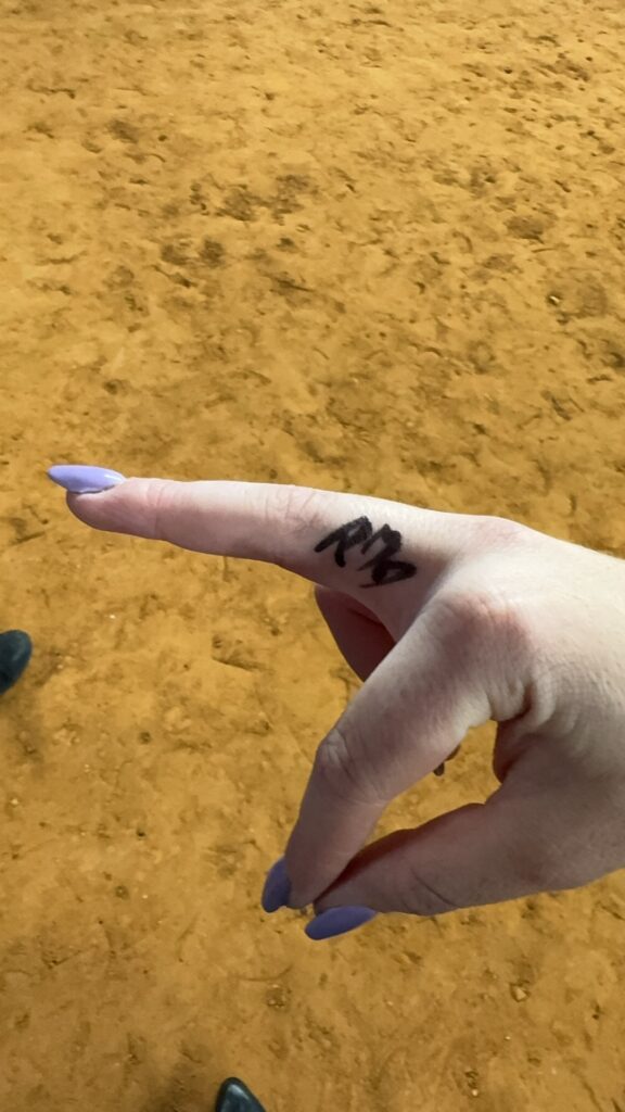 A devoted fan's dedication reaches new heights as she tattoos Post Malone's autograph on her hand shortly after meeting him.