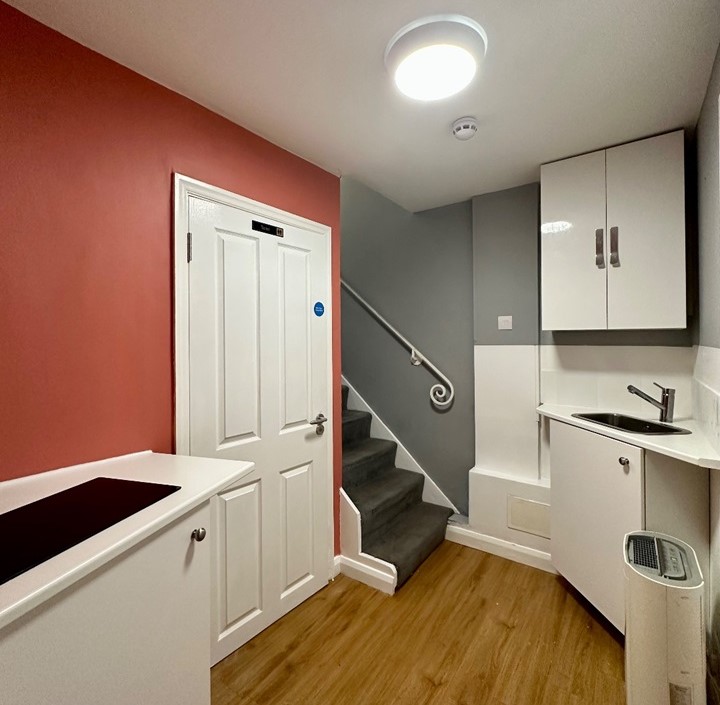 Basement Flat in Bristol Dubbed 'Prison Cell' with Shower Next to Bed Sparks Outrage Online. Hefty £1,550/Month Rent Stuns Viewers.