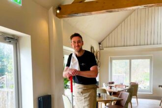 Stuart Broad, retired cricket hero, opens his second pub, The Griffin Inn, in Swithland, Leics. He's seen helping out before the grand opening, owning it with friend Harry Gurney. Fans and locals praise the beautiful decor and wish them success.