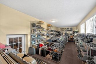 Explore a unique home in Columbus, Ohio resembling a museum, with an impressive array of collections including typewriters, pocket watches, and vintage radios.