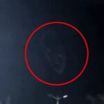 Locals left baffled as eerie face with glowing eyes appears in night sky, sparking comparisons to Harry Potter's Lord Voldemort. Video of the mysterious phenomenon in Curacavi City, Chile, goes viral on TikTok with 2.1M views. Speculations range from hologram to reflection.