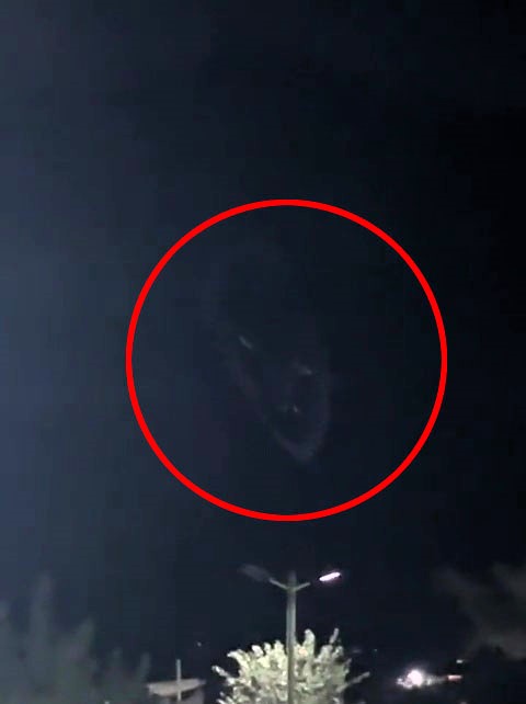Locals left baffled as eerie face with glowing eyes appears in night sky, sparking comparisons to Harry Potter's Lord Voldemort. Video of the mysterious phenomenon in Curacavi City, Chile, goes viral on TikTok with 2.1M views. Speculations range from hologram to reflection.