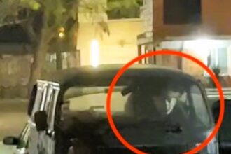 A man encounters a chilling 'vampire' in a parked car during his early morning workout, sparking fear and comparisons to iconic horror movie characters.