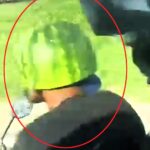 A biker in Brazil surprises onlookers by wearing a hollowed-out watermelon as a helmet while cruising on a motorway near Rio de Janeiro. Authorities warn of penalties for riding without proper headgear.
