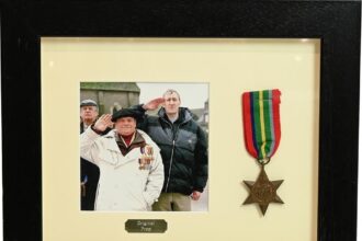 Fools and Horses' Uncle Albert's WW2 medal, worn by actor Buster Merryfield, fetches £1,100 at auction. Rare prop from beloved sitcom.