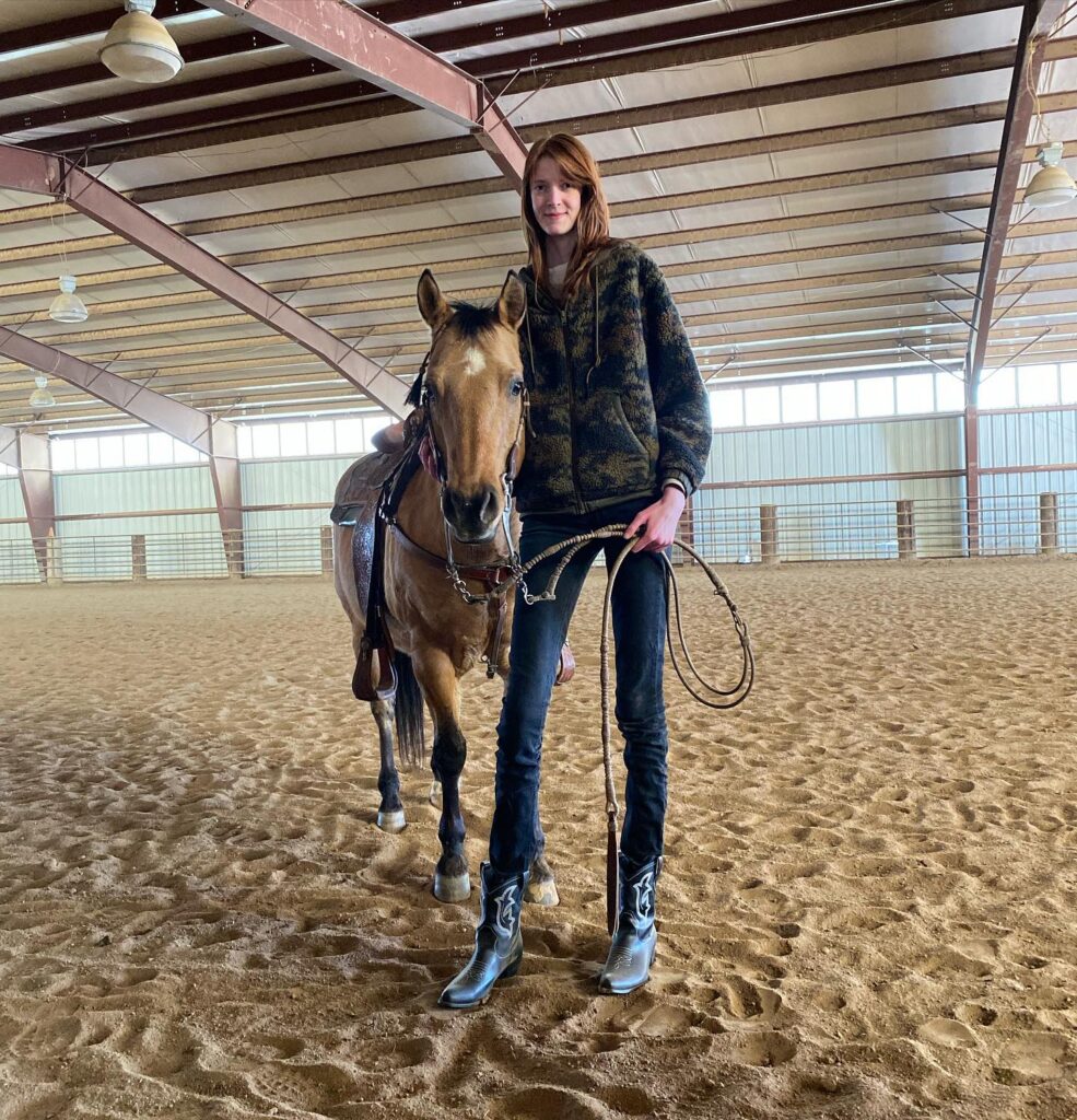 Maci Currin, with record-breaking legs, embraces uniqueness despite trolls' comparisons to Slenderman. Standing at 6'10", she's empowering tall women worldwide.