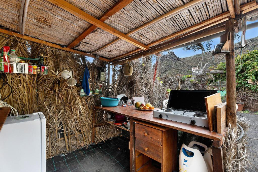 Discover an unconventional holiday rental just £20 per night in a garden hut, offering sea views and basic amenities, near Playa del Verodal, Costa del Sol, Spain.