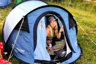 A determined British woman spends £5,000 and two months traveling to New Zealand by train and boat after being told she couldn't fly due to a health condition.