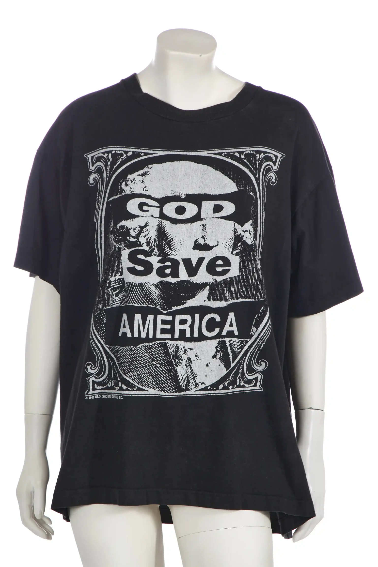 Kate Moss's £600 T-shirt, worn on an i-D magazine cover in 2004, features a print of George Washington with 'God Save America' slogan, set for auction.