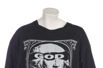 Kate Moss's £600 T-shirt, worn on an i-D magazine cover in 2004, features a print of George Washington with 'God Save America' slogan, set for auction.