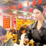 Diners at a Chongqing restaurant were stunned by what appeared to be a robot waitress serving meals, only to discover it was actually the manager, Qin, showcasing her impressive dance skills to entertain customers.