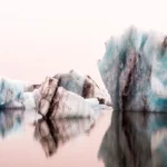 Experience the breathtaking beauty of epic icebergs captured by British photographer Stephen Dean during his trips to Iceland and Svalbard.