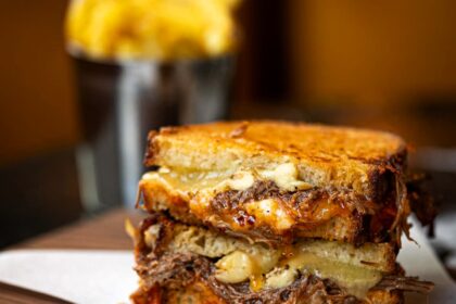 Gordon Ramsay offers an 'idiot sandwich' for £24, complete with braised short rib, cheddar, confit mushrooms, and spiced tomato chutney on sourdough. Mixed reactions ensue.