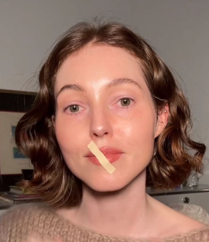 Mouth taping for jaw pain relief has gone viral, with claims of a slimmer face. Devon Kelly, 31, shares her experience and the controversial method's impact.