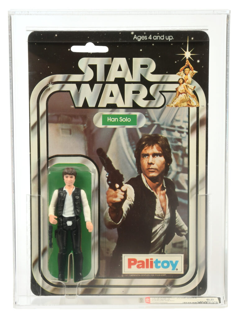 Vintage Luke Skywalker and Han Solo toys, sealed in original packaging, are up for auction, each expected to fetch £12,000. Also included are a Yak Face figure and a Jawa toy with a vinyl cape, among other Star Wars memorabilia.
