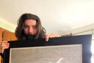 An Emmy-winning artist, Mike Matola, mesmerizes fans with his meticulous hand-written artwork, including a Lord of the Rings script piece now fetching £5,500.