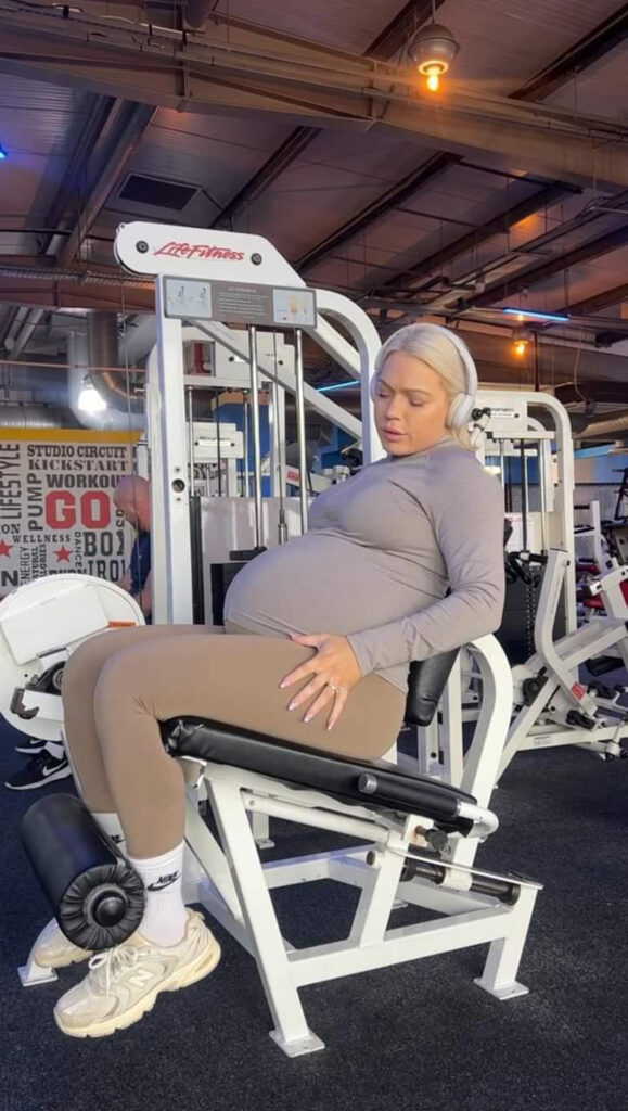 A pregnant bodybuilder defends her decision to continue exercising, citing health benefits and previous successful pregnancies. Despite criticism, she plans to resume her routine after giving birth.