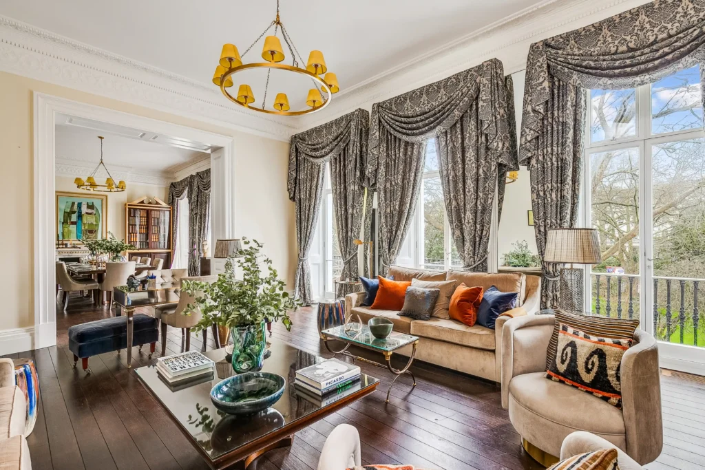 For £9,500 a week, you can rent a three-bedroom flat in London's prestigious Eaton Square, with notable past residents including Prime Ministers and celebrities like Sean Connery. The property features period details, two living rooms, two private balconies, and access to Eaton Square gardens and tennis courts.