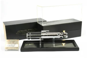 Star Wars memorabilia, including a Luke Skywalker action figure and signed lightsaber, fetches £145K at auction. Items from the iconic franchise draw enthusiasts worldwide, with vintage toys and rare pieces commanding high prices.