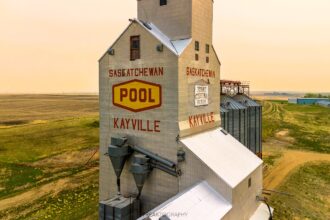 Urban explorer 'Freaktography' uncovers the haunting remains of Kayville, a ghost town in Saskatchewan, Canada. Once a vibrant community, it now lies abandoned, with only 10 residents remaining. Economic shifts and improved transportation led to its decline, leaving behind empty buildings, including a church, school, and homes. Dave's exploration, shared on YouTube, offers a glimpse into the town's past, evoking both fascination and nostalgia among viewers.