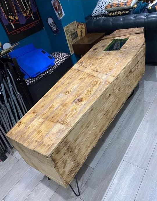 Get ready to spook your guests with a handmade coffin coffee table featuring Michael Myers' face, available on Facebook Marketplace for £150. Standing over 6ft long, it's a bargain compared to cardboard coffins sold elsewhere. Collection in Manchester, but be prepared for some terrified visitors!