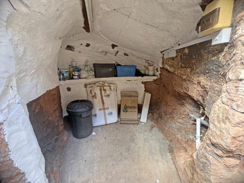 Charming terraced cottage in Bridgnorth, Shropshire, boasts a unique garden cave feature. Ideal for first-time buyers or downsizers, listed at £167,500.
