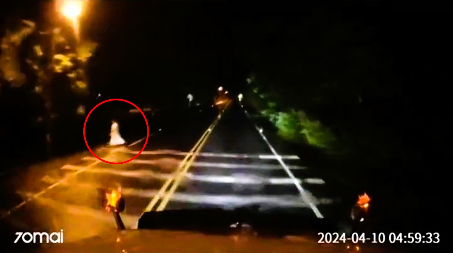 A dashcam captures a spine-chilling moment as a "ghost" crosses a road in Colombia. Social media erupts with debates over the eerie sighting, with some convinced of the paranormal and others offering mundane explanations.