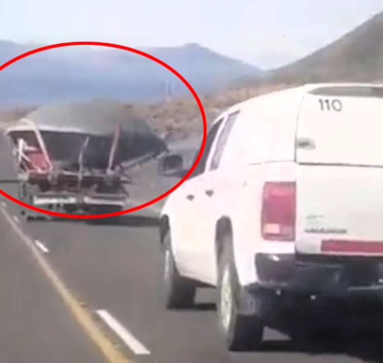 A dome-shaped object resembling a UFO spotted on a truck in Argentina sparks debate about its origin and purpose among locals.