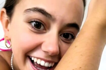 Spencer Barbosa, a 21-year-old from Toronto, embraces her natural body hair despite online backlash, aiming to empower others to accept themselves.