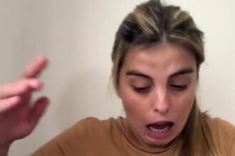 Woman's TikTok video (@evangelinaabez) goes viral after revealing supermarket chocolate egg filled with insects. Clip shows bugs flying out, alarming creator and viewers. Video captioned "Easter surprise" gathers over 1.1m views. Supermarket not disclosed.