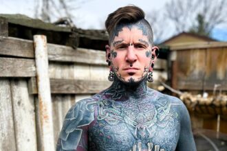 Jeremy Schofield, known as Remy, has spent nearly £240,000 on tattoos, covering over 97% of his body. With over 2,200 hours under the needle, he's on a mission to become the most tattooed person ever, facing trolls and defying expectations.