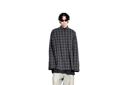 Balenciaga ridiculed for selling a bag that looks like a shirt in its Spring 25 Collection. The quirky Garde Robe Shirt Bag, priced at £1,190, sparks online mockery.