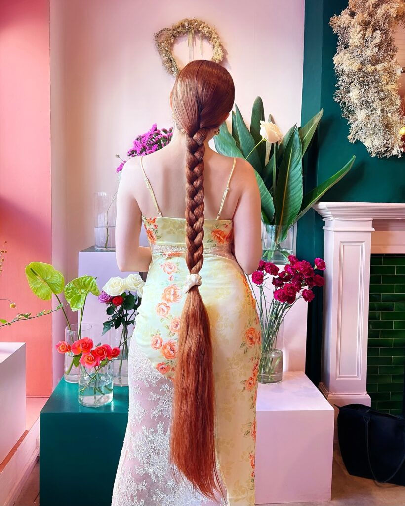 A UK woman dubbed 'real life Rapunzel' shares her secret to 4ft 7in hair growth: homemade rosemary oil and water treatments. Learn her routine for long, luscious locks.