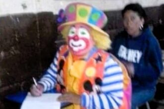 A student surprises classmates by taking his criminal law exam dressed as a clown, having just come from a party performance.