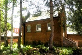 Looking for a unique property? Consider 'Lillian's House', a former mortuary studio in Exeter, Devon, now up for auction. With potential for office space and a patio, it's a steal starting at £50,000. But beware, it comes with some ghostly neighbors!