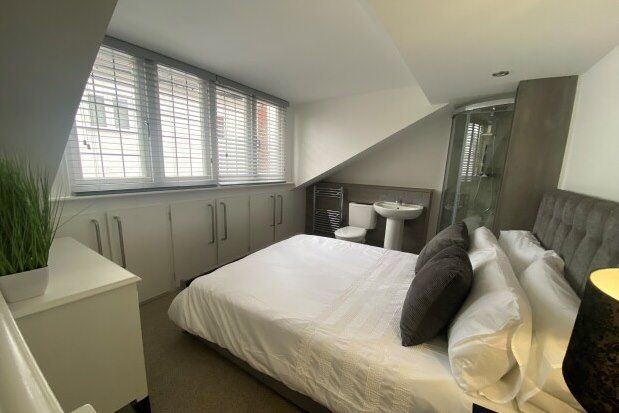 A duplex studio flat in Derby has raised eyebrows with its unconventional "open plan en suite" layout, featuring a toilet right next to the bed. Despite its city centre location and other amenities, prospective renters were shocked by the unorthodox setup, with some likening it to a prison cell.
