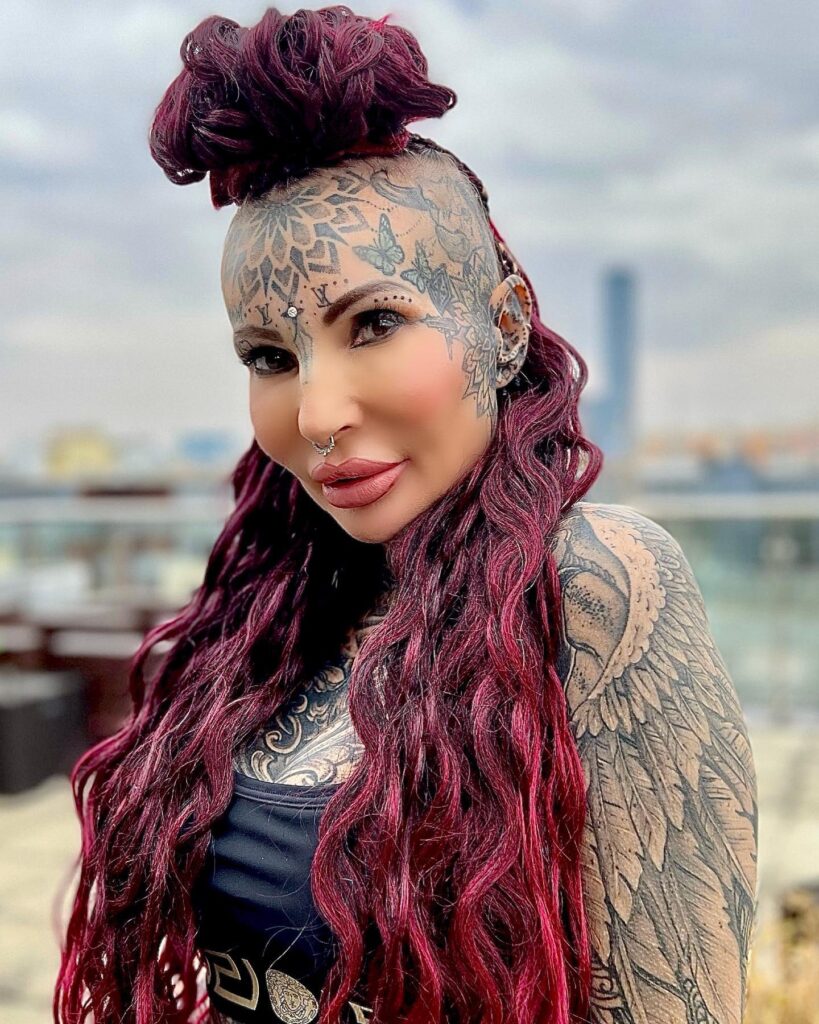Influencer with Louis Vuitton tattoo on her face outraged after a three-hour wait to enter LV café in Bangkok, only to find her desired cookie unavailable.