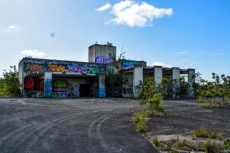 Explore the eerie remnants of a once bustling rocket facility turned urban decay, as captured by an intrepid explorer in this haunting journey.