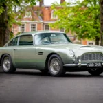 A classic 1964 Aston Martin DB5, famously driven by James Bond, is hitting the auction block in Berkshire. With a top speed exceeding 150mph, this sage green beauty is a rare find, one of just 887 ever made. Expected to fetch £425,000 - £475,000.