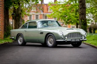 A classic 1964 Aston Martin DB5, famously driven by James Bond, is hitting the auction block in Berkshire. With a top speed exceeding 150mph, this sage green beauty is a rare find, one of just 887 ever made. Expected to fetch £425,000 - £475,000.