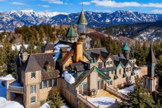 Explore a fairy tale castle in Turnerville, Wyoming, boasting old-world glamour, lush surroundings, and modern comforts, listed for $14m.