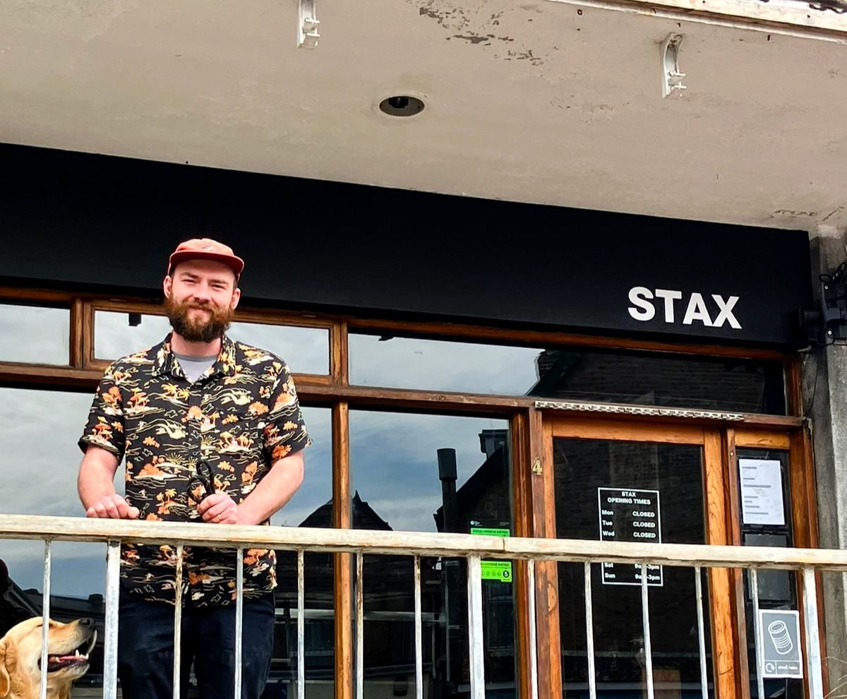 Chef Ben Harrison, former apprentice of Marco Pierre White, opens Stax on Newquay Beach, offering innovative sandwiches inspired by global culinary journeys and a unique blend of food and vinyl music.