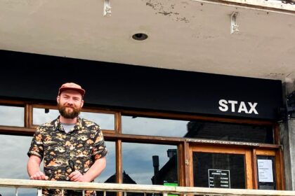 Chef Ben Harrison, former apprentice of Marco Pierre White, opens Stax on Newquay Beach, offering innovative sandwiches inspired by global culinary journeys and a unique blend of food and vinyl music.