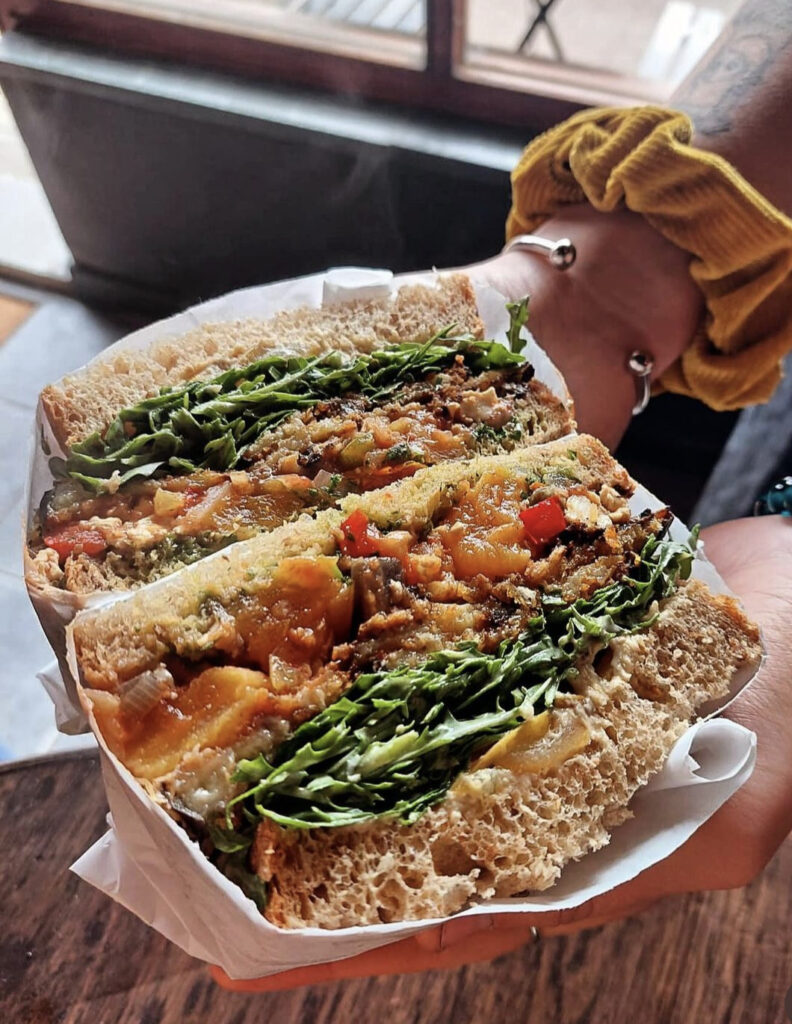 Chef Ben Harrison, former apprentice of Marco Pierre White, opens Stax on Newquay Beach, offering innovative sandwiches inspired by global culinary journeys and a unique blend of food and vinyl music.