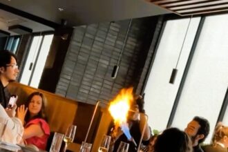 A group of restaurant customers at Harpers in Nashville were drenched by sprinklers after a flaming dish caused them to activate. The TikTok video of the incident has gone viral with over 2.3 million views.