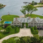 The most expensive house in Greenwich, Connecticut, known as the ‘city of billionaires,’ is on the market for $49.5 million. This waterfront home features six bedrooms, a private beach, and luxurious amenities, offering spectacular views and timeless architecture.